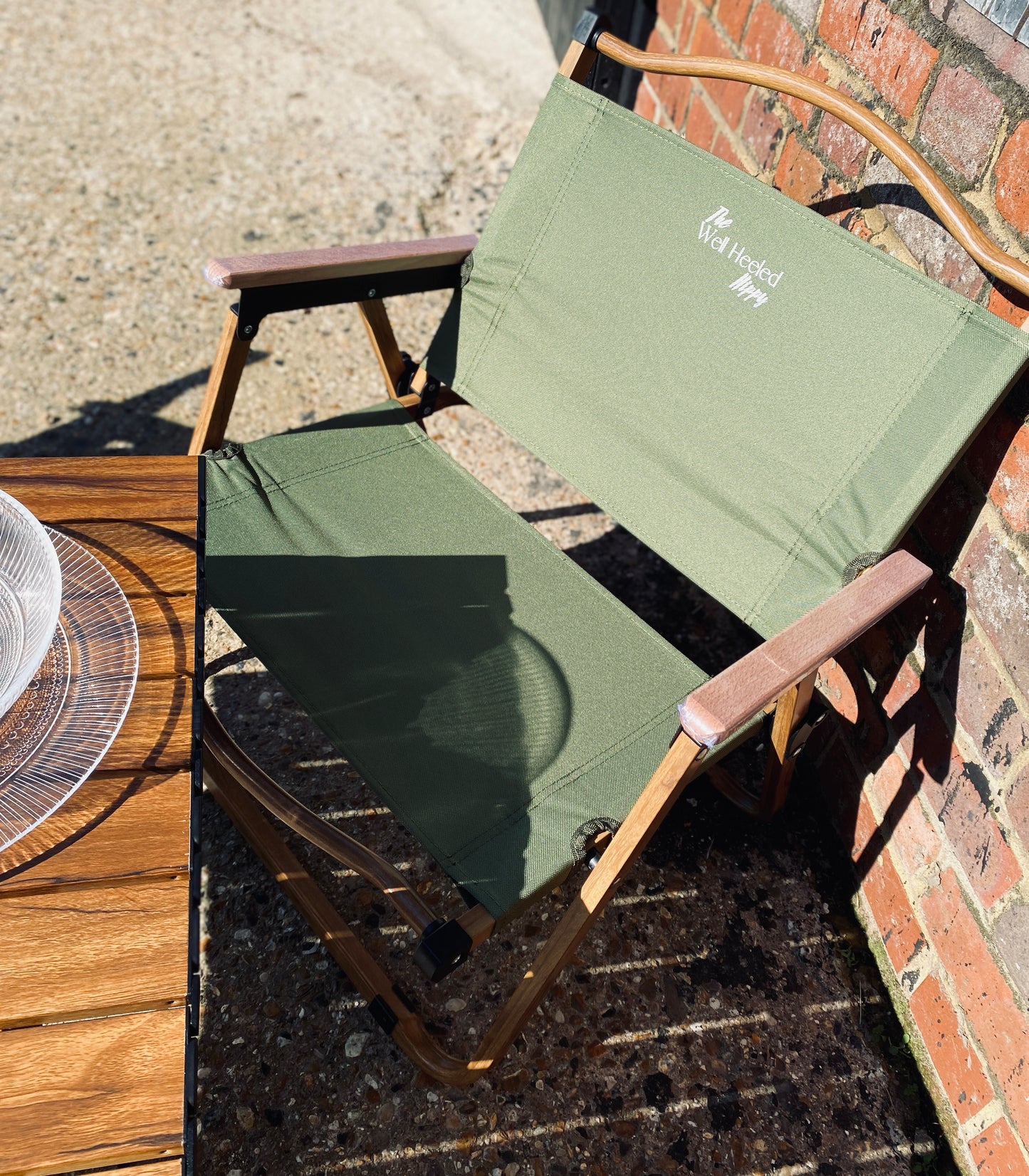 A foldable, portable, luxury safari chair by The Well Heeled Hippy - perfect for patio, festivals, camping and picnicking... shown here in khaki green