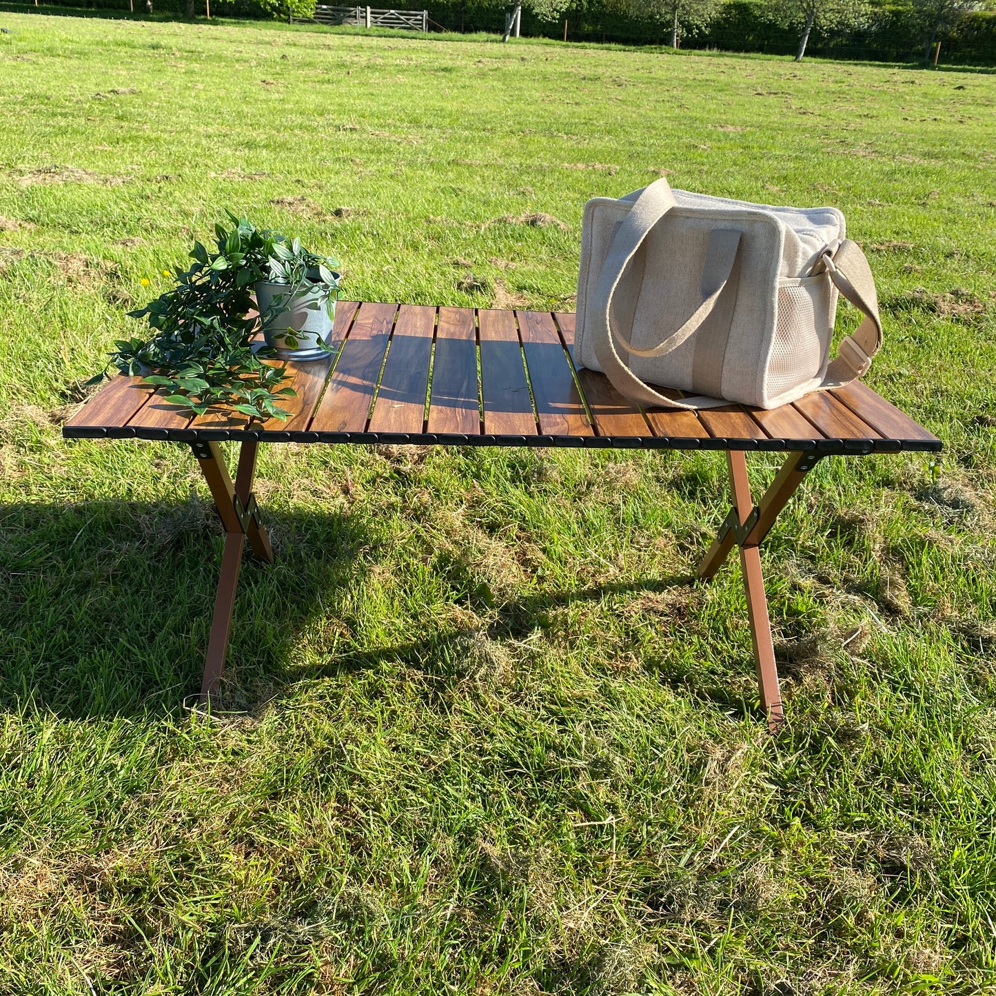 A lightweight, foldable, portable picnic table by The Well Heeled Hippy. Perfect for camping, glamping and picnicing