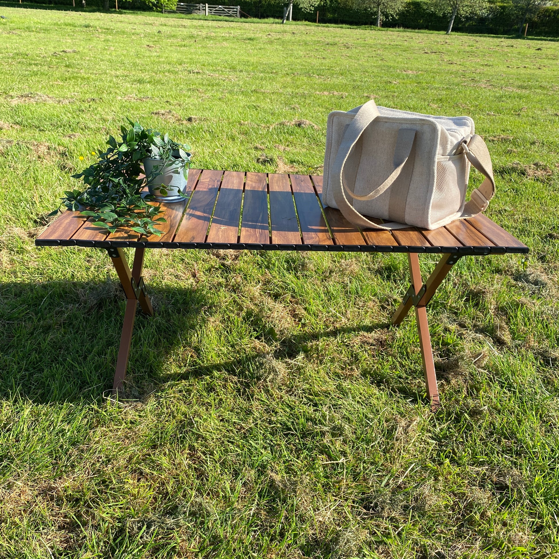 A lightweight, foldable, portable picnic table by The Well Heeled Hippy. Perfect for camping, glamping and picnicing
